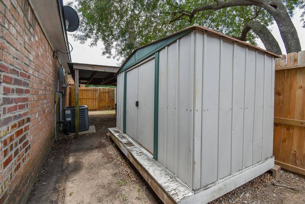 Spacious metal storage shed for all your organizational needs.