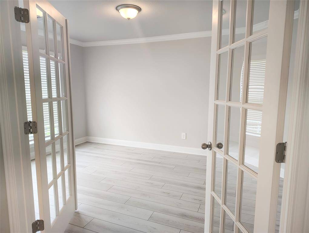 OFFICE/FLEX ROOM WITH GLASS FRENCH DOORS STOCK PHOTO