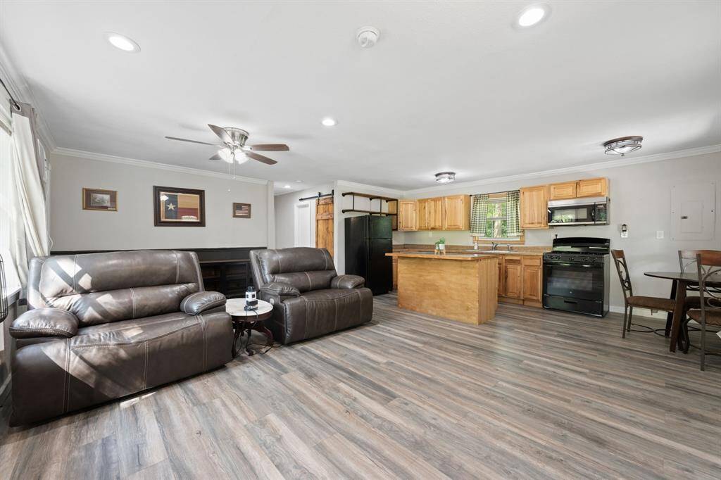 Walk into the living room, kitchen/dining combo.  It's all in one space and is wheel chair accessible.