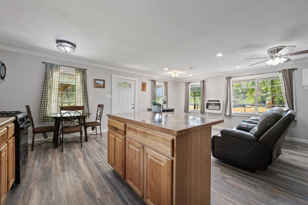 The breakfast area, kitchen, and living room are all in one space so the cook doesn't miss out on anything!