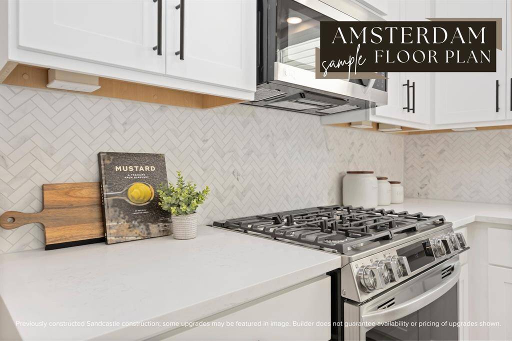 Culinary excellence awaits in a kitchen adorned with a large island, abundant quartz countertops, and ample space for two chefs to work together seamlessly. Enjoy the convenience of soft-close drawers and a waste bin pull-out, adding a touch of luxury to your cooking experience.
