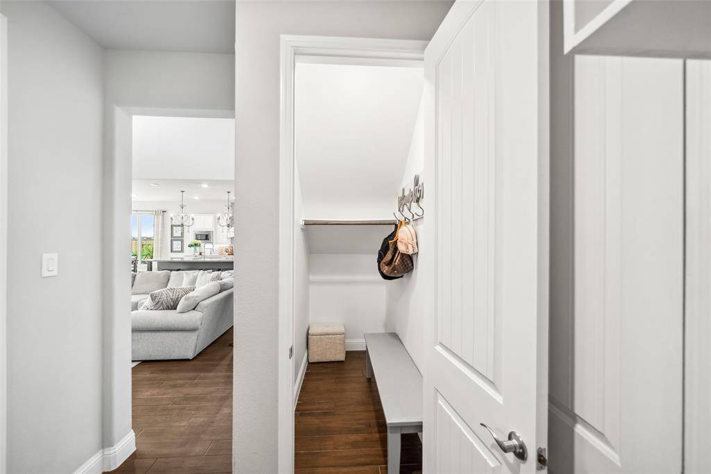 Mudroom closet has plenty of storage space for coats, shoes, bags, and more!
