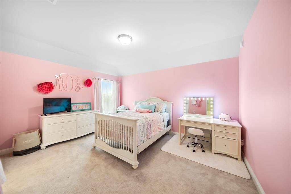 At the top of the stairs lies the 1st and largest secondary bedroom which is a suite with its own ensuite bathroom and enormous walk-in closet!