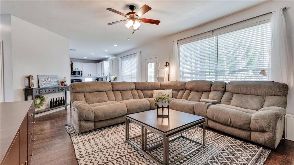 Family room looking toward the open concept breakfast area and kitchen