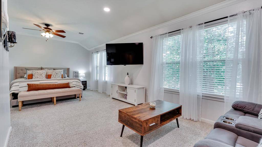 Relax and enjoy the sitting area in your master bedroom too.