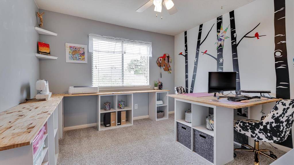 3rd bedroom being utilized for their craft room
