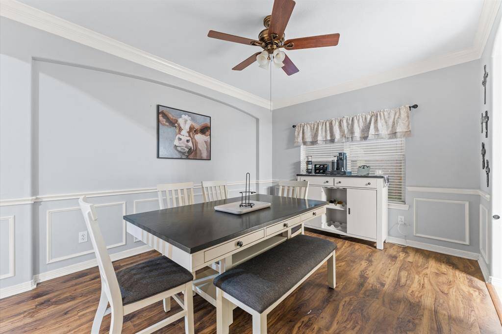 This is the formal dining room.  The floor plan pictures have accurate measurements of room sizes.  This room is a great size.