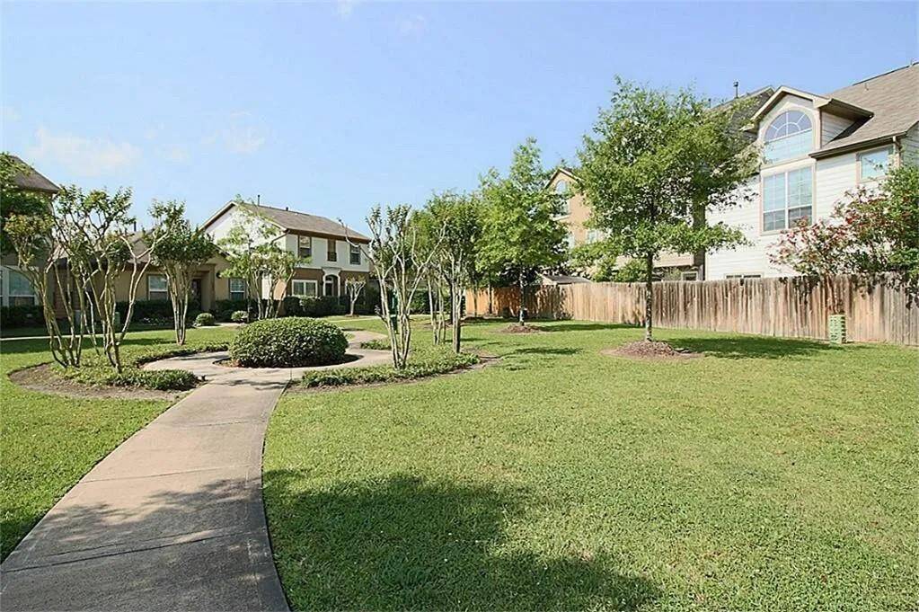 In front of the home is the lovely courtyard