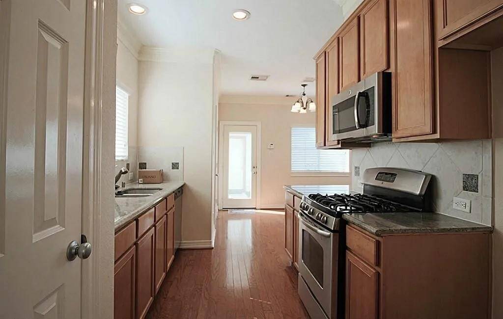 Kitchen has all stainless steel appliances