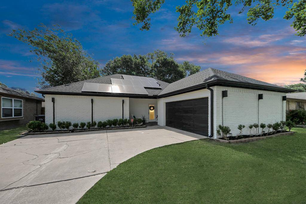 Beautiful front elevation with side garage.