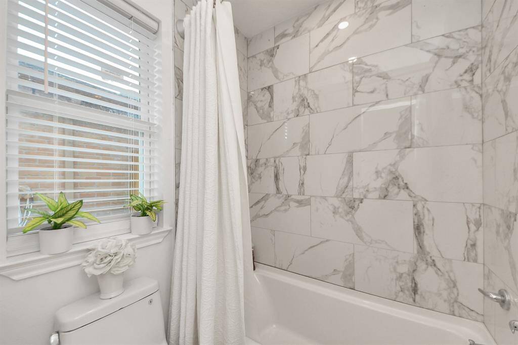 shower with nice tile.