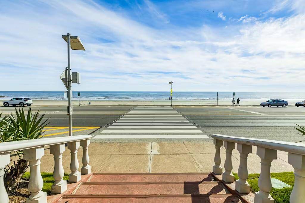 Just steps from the sand- walk directly across the street to the beach from your condo at The San Luis.