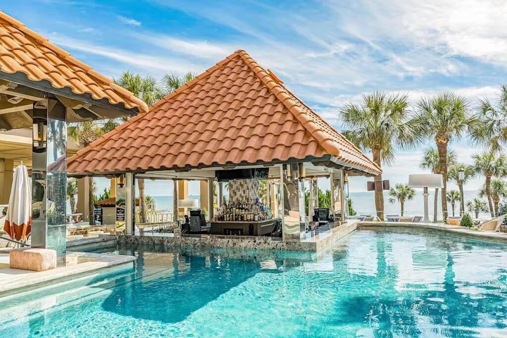 Sip and unwind with full bar service available poolside throughout the day.