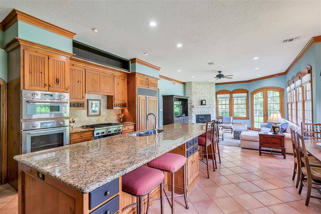A view of Kitchen and Family room in the background
