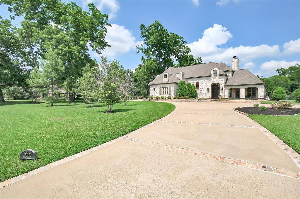 Over one acre lot provides privacy and a serene setting