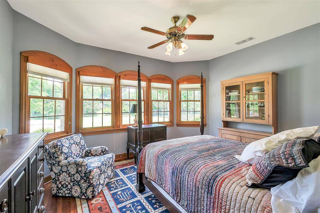 Another secondary bedroom with beautiful views of the back yard