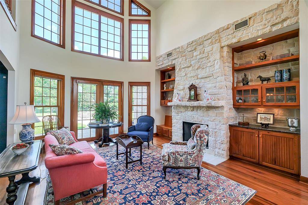 Custom built-ins surround the fireplace