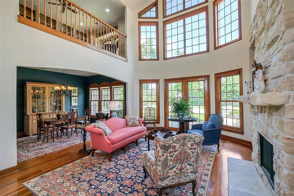 Living room opens to the Dining room with Library upstairs