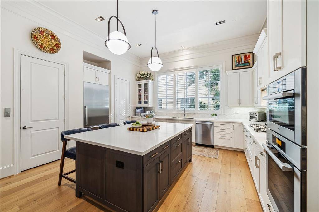 Pictured on the left, this door opens to the private in-home elevator which offers ease of access to every level.