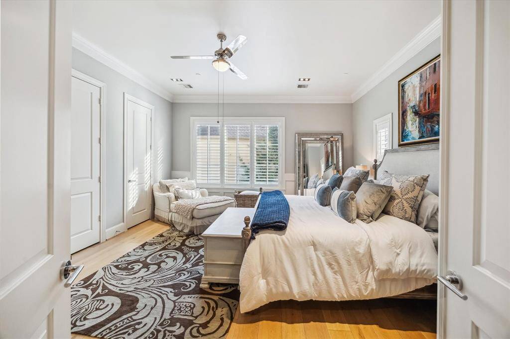 Another view of the primary bedroom with an abundance of natural light.