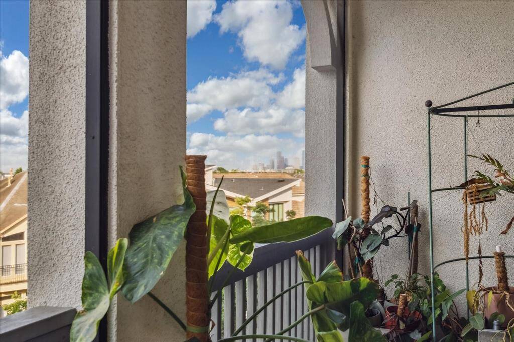 Enjoy views of Downtown Houston from the completely screened in fourth-floor patio!