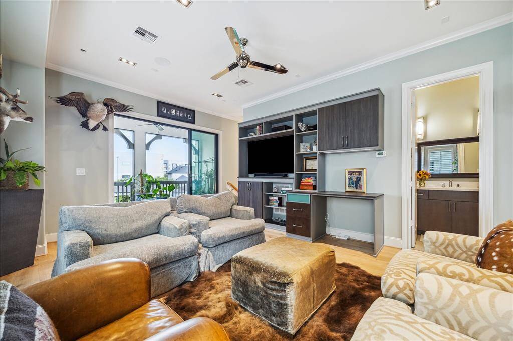Custom storage solutions were also recently installed by California Closet in the game room.