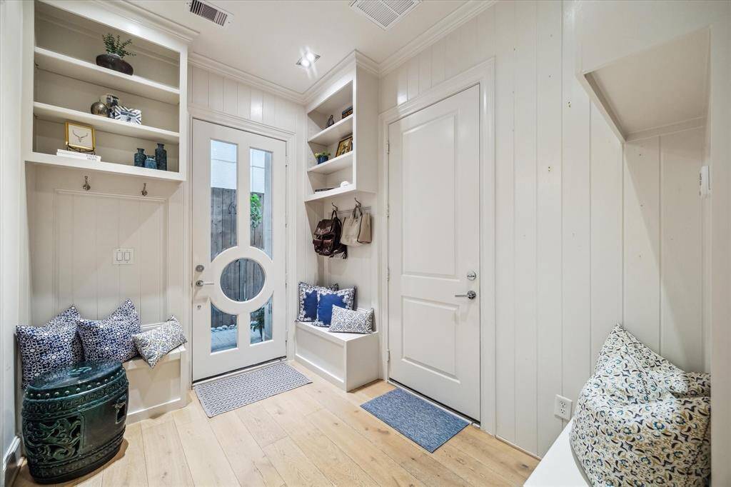 Custom built-in cabinets have been installed to ensure your have an abundance of storage options.  Beadboard walls add to the charm in this welcoming space.