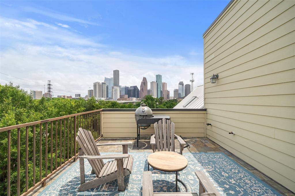 Rooftop patio with unparalleled views of downtown and surrounding greenery