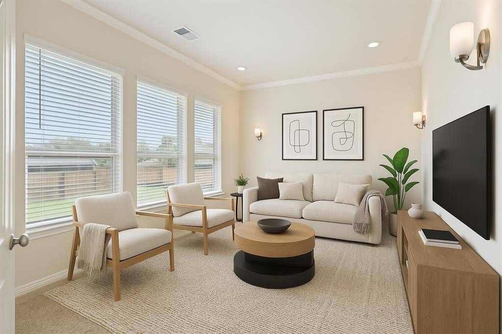 The enclosed media room that is also perfect for a second home office or play room. This image is virtually staged.