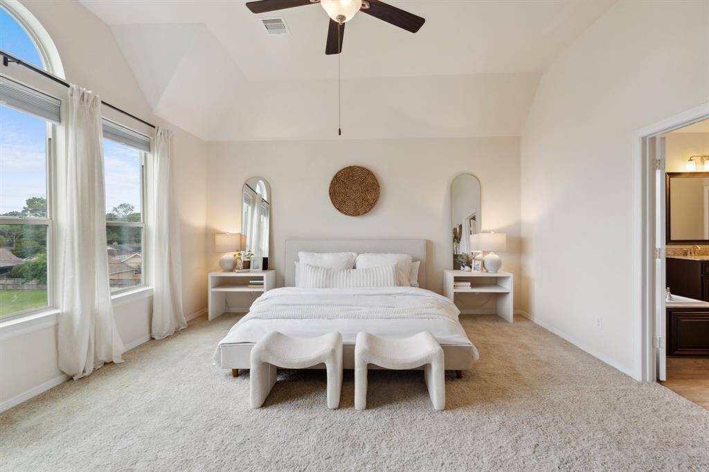 The primary suite located on the 3rd floor is a luxurious retreat.