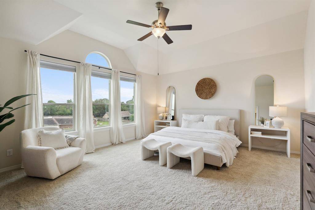 Complete with high ceilings and picturesque windows overlooking luscious green space.
