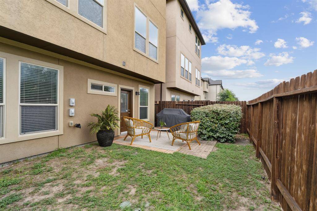 Step outside to your private fenced backyard with a charming patio- an inviting space to unwind, play or host guests. The Weber Summit barbecue grill is included with the house and ready for summer grilling!