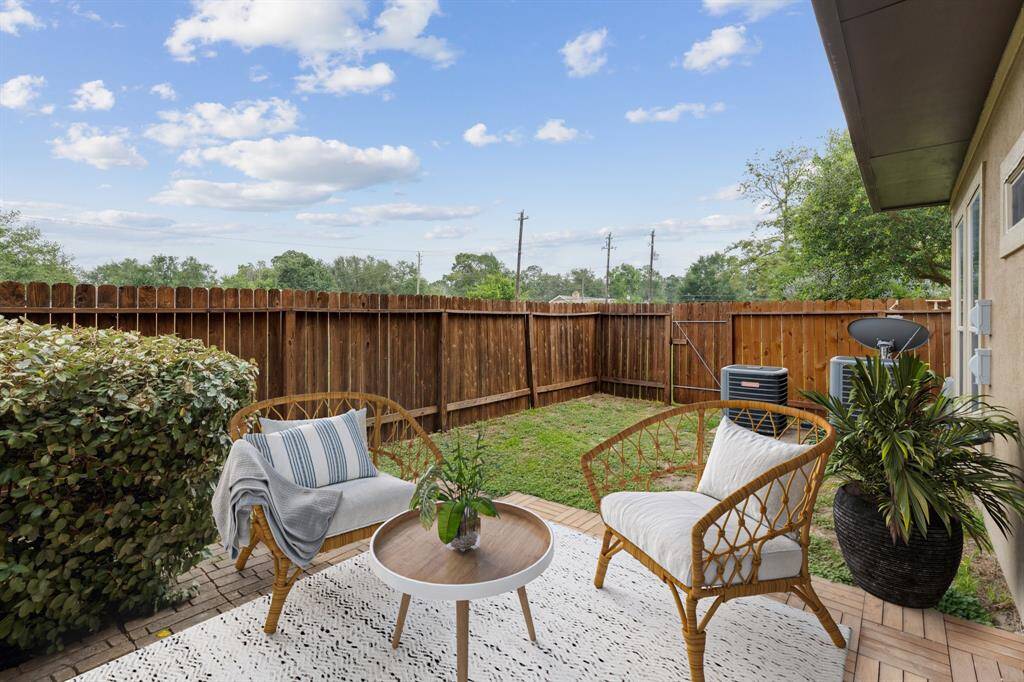 The backyard backs up to open space, offering a rare sense of privacy with no neighbors behind.