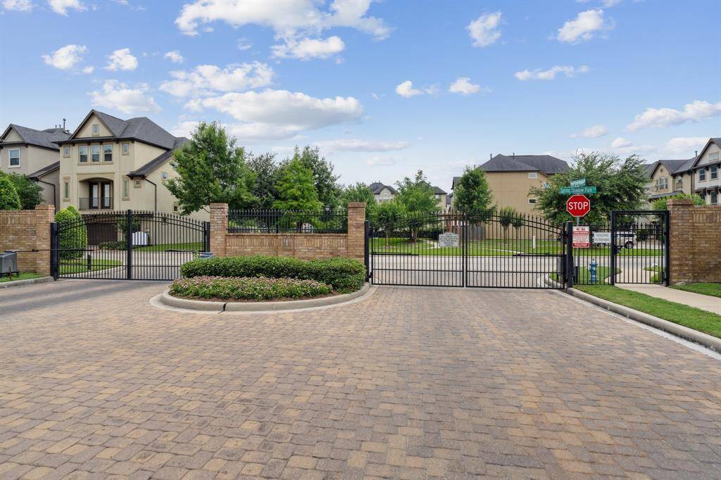 Enjoy the tranquility of a quiet, family-friendly neighborhood with gated access and plenty of green space for outdoor activities.