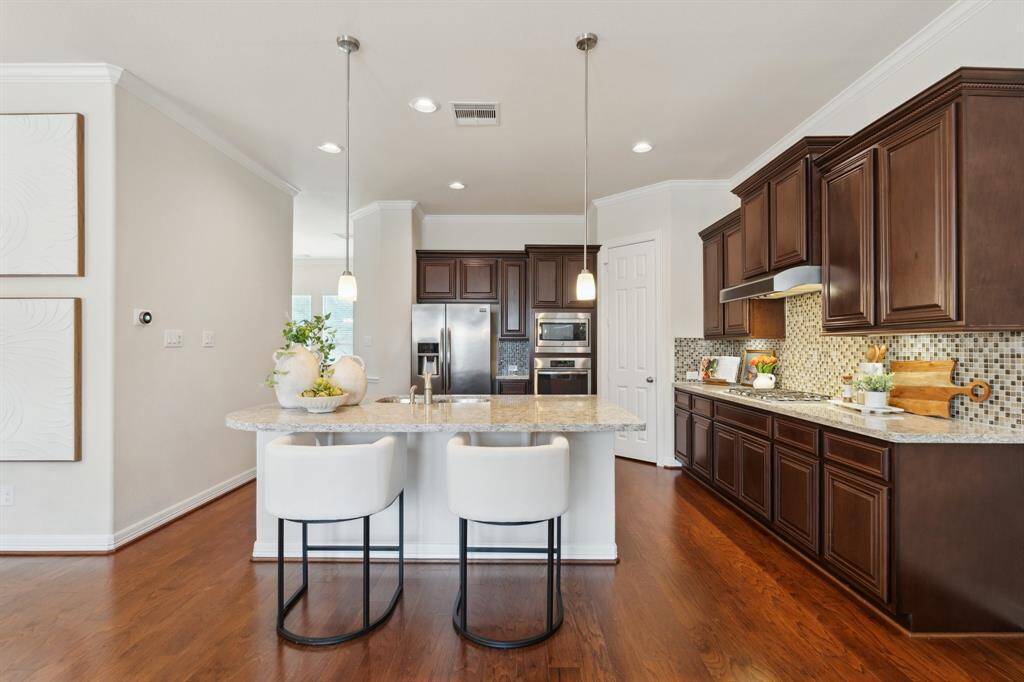 The heart of the home is the chef's kitchen, a culinary enthusiast's dream.