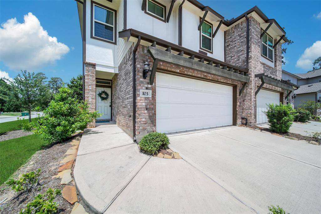 103 Skyshine Court, boast a premium corner lot and 2 car garage with automatic door opener!