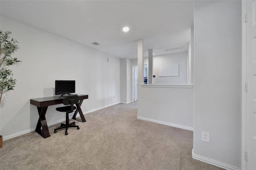 Convenient loft area located between primary and secondary bedrooms.