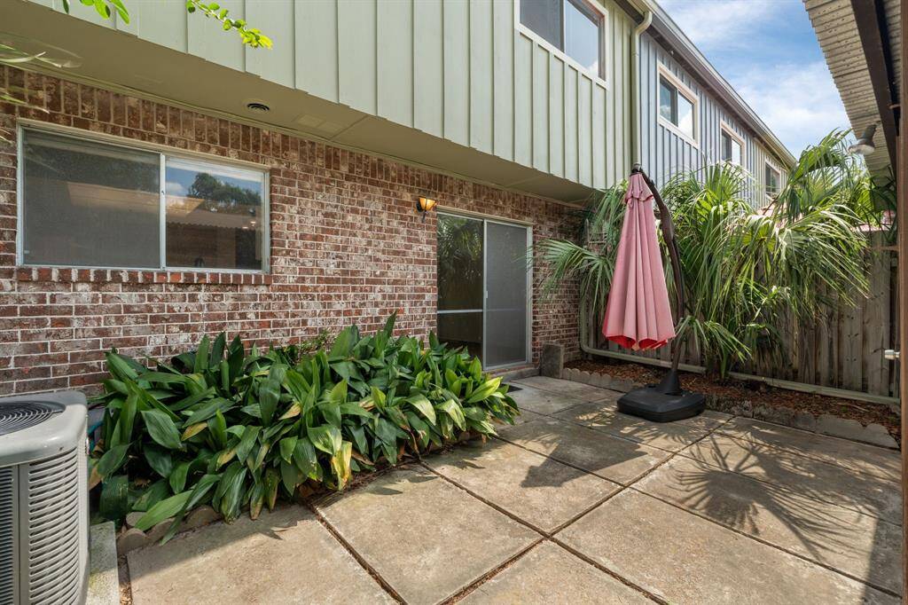 Beautiful Private Terrace - equipped with lush landscaping and storage shed.