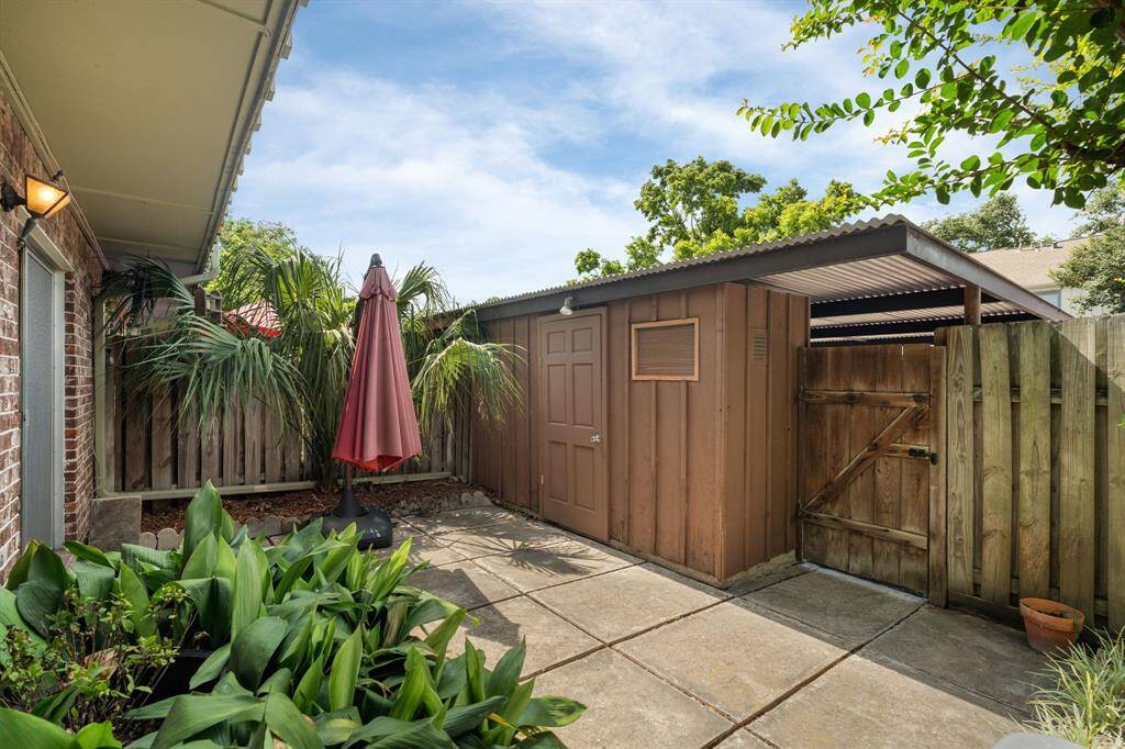 Beautiful Private Terrace - equipped with lush landscaping and storage shed.
