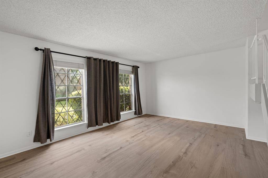 Beautiful large windows in the living area look out into the courtyard.