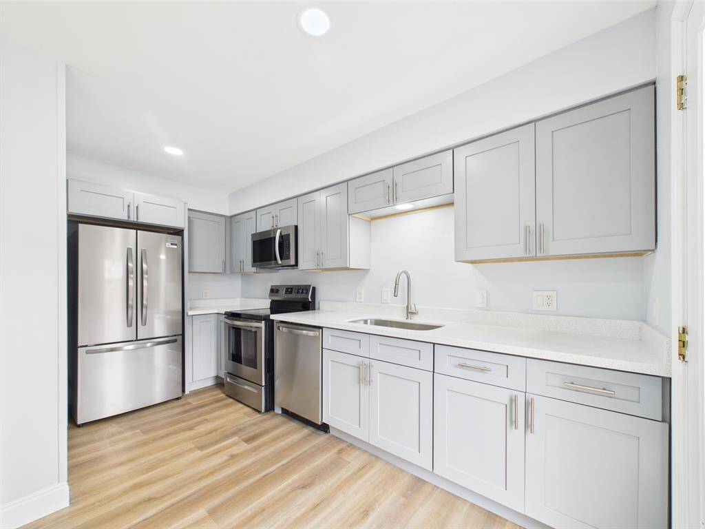 Updated Kitchen with Stone Counters & SS Appliances