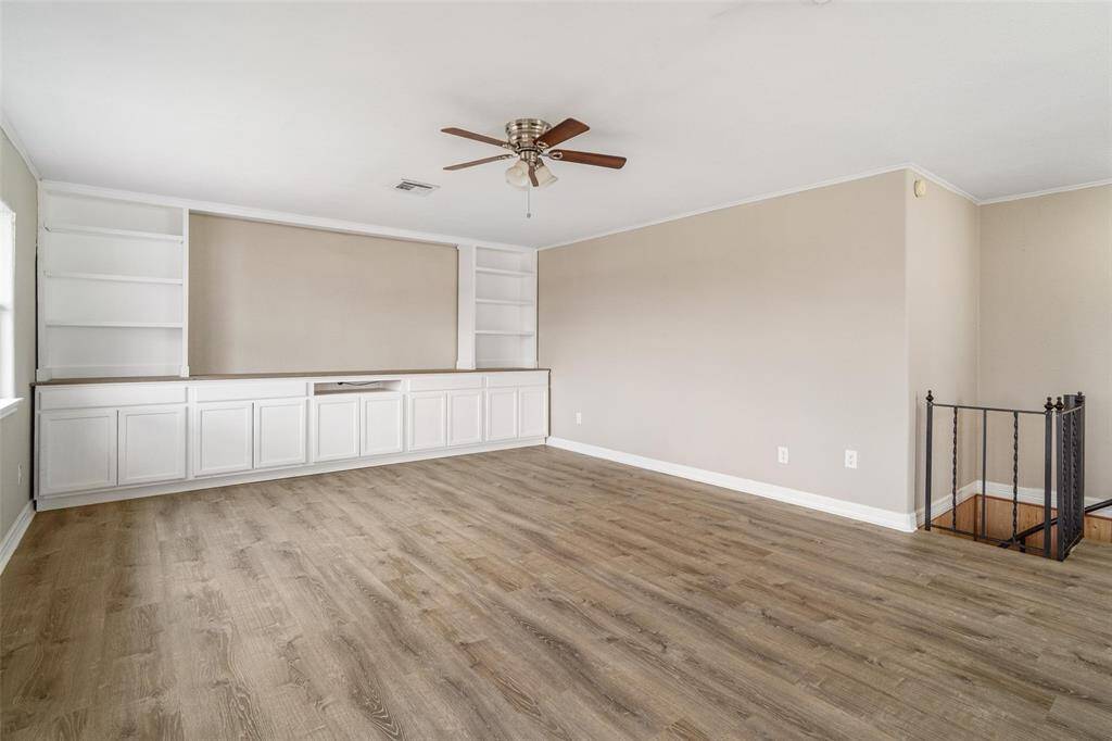 Recent updates include luxury vinyl plank floors and a custom entertainment center to hold your mega TV, electronics, books, video games and gaming systems