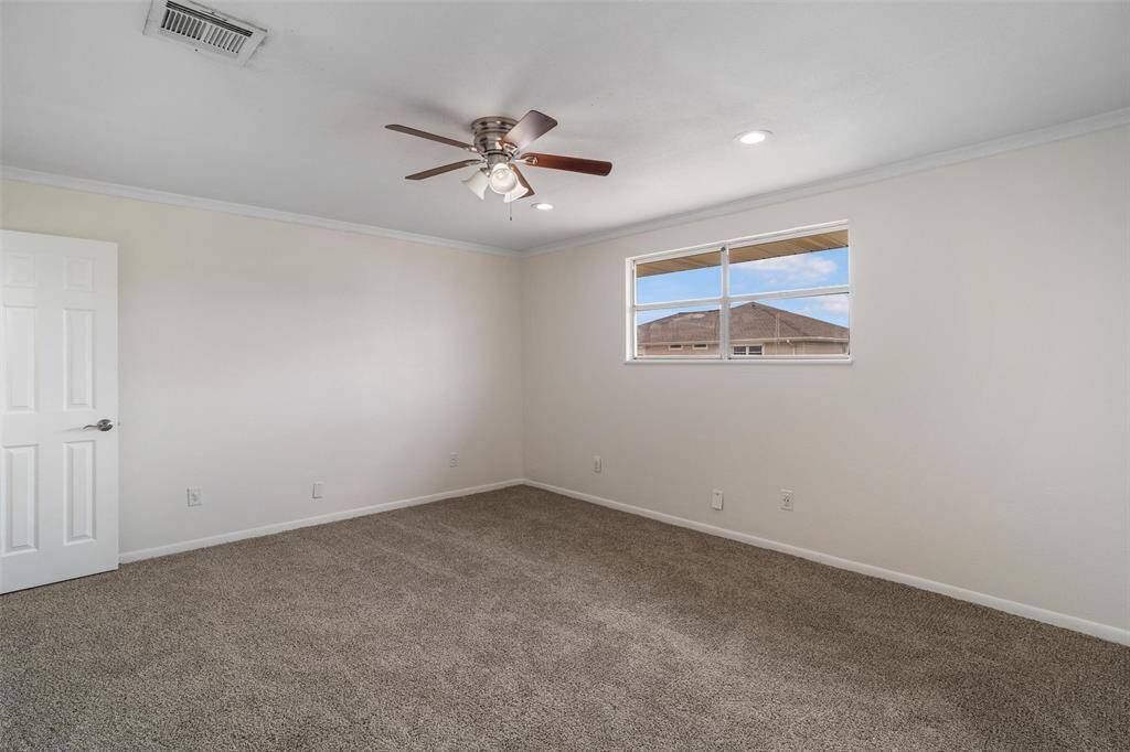 Over sized primary bedroom with recently updated carpet