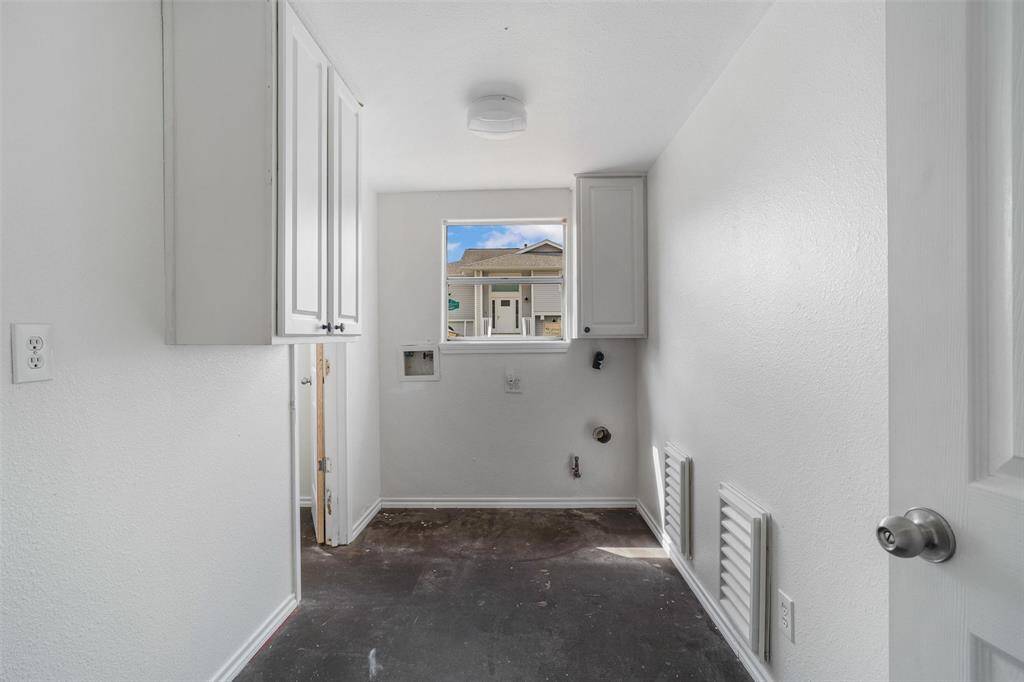 Downstairs very large laundry room and a full bathroom