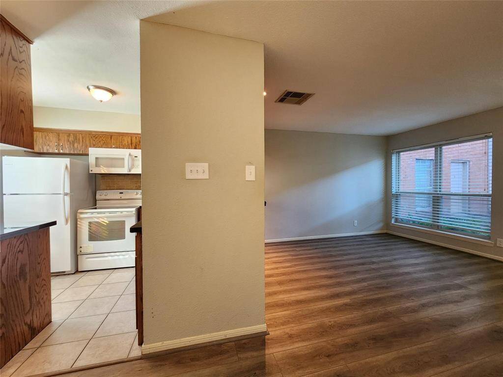 A modern vibe with the warmth of hardwood flooring.