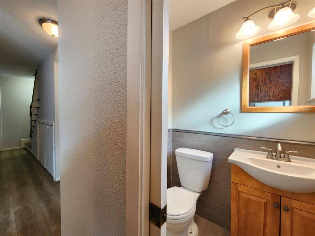 Powder room finished out in a very chic style.