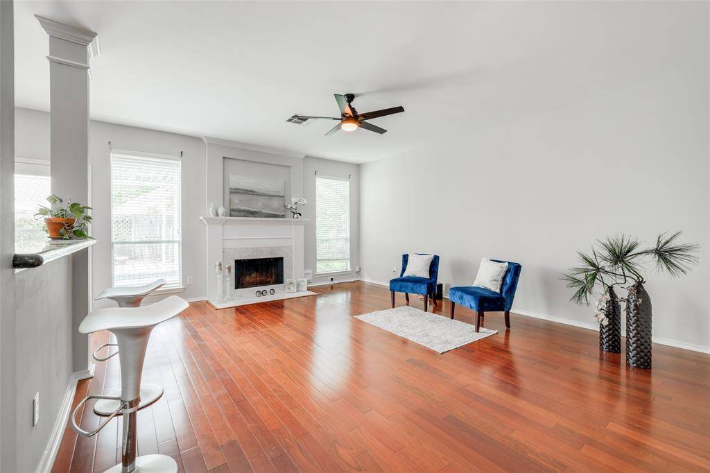 Living Room with wall of windows out to the back yard