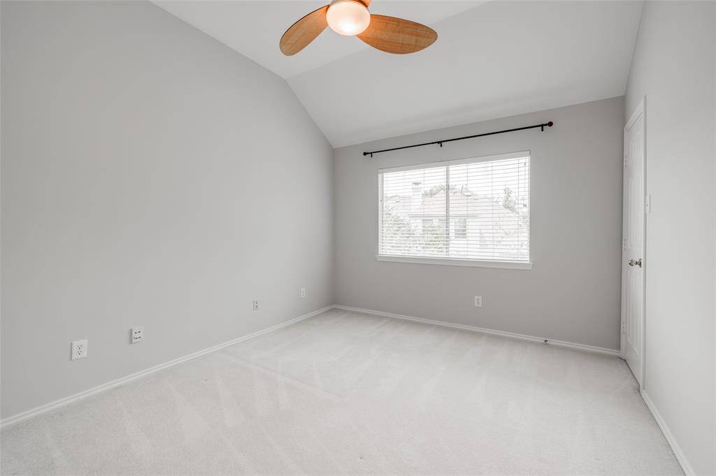 Third bedroom also has raised ceilings, ceiling fan with light fixture, two inch window blinds and nice closet space.