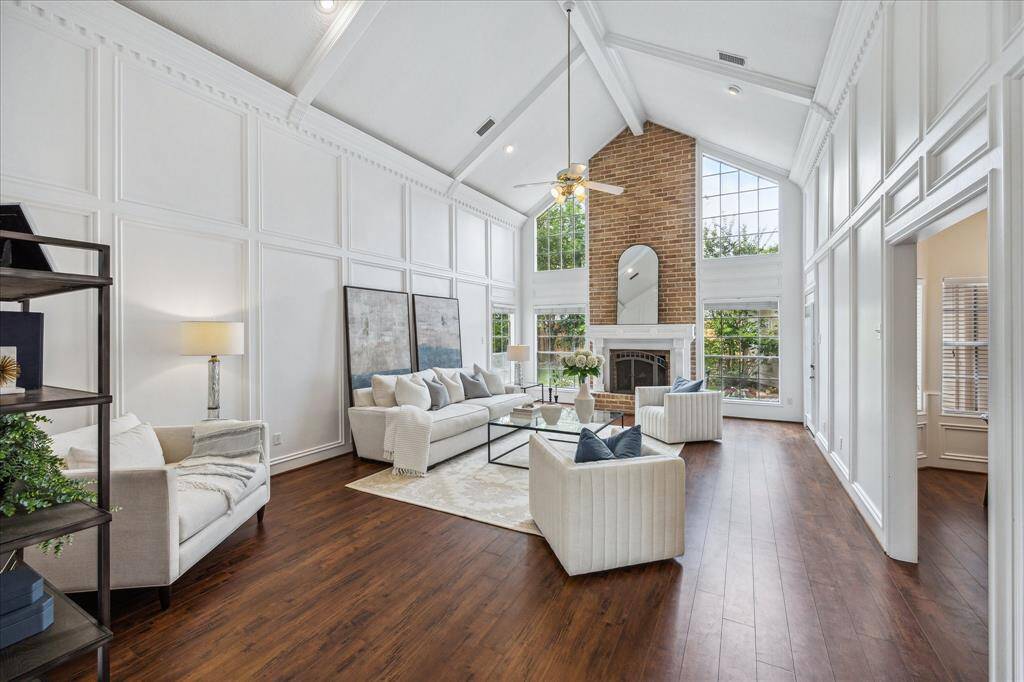 Breathtaking two story family room with cathedral ceiling offers majestic views