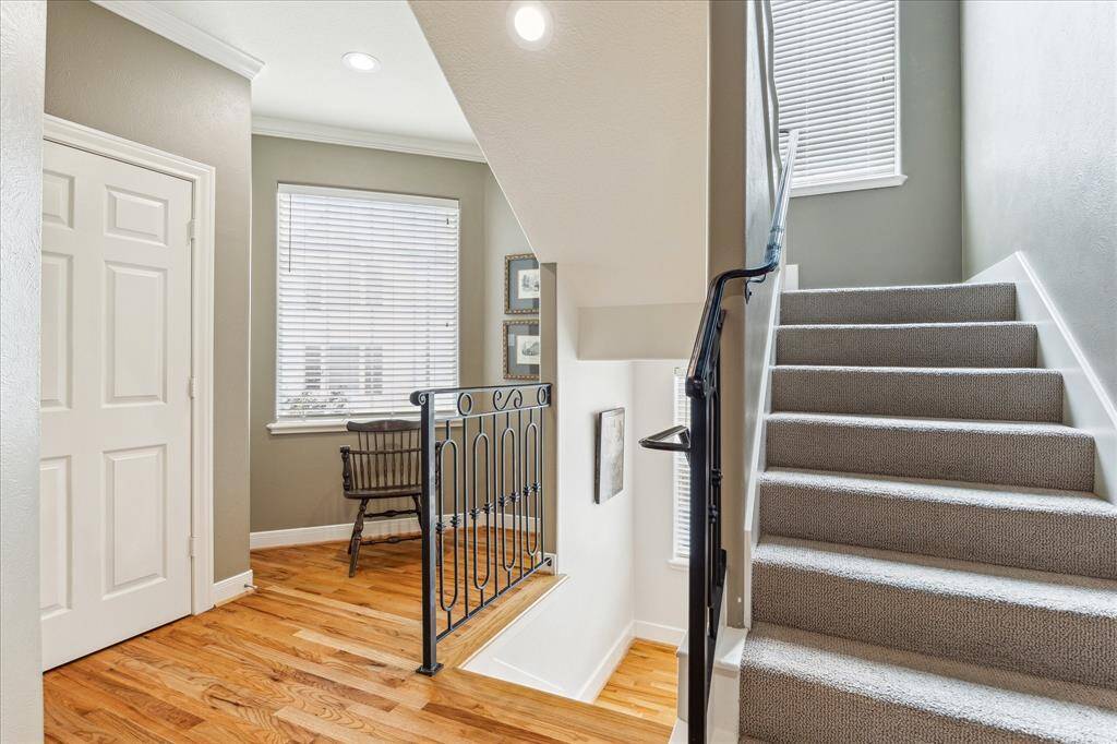 There are reading nooks at the stairway landings on both the second and third level. At left is a large closet that is also the elevator shaft reaching to the third floor.